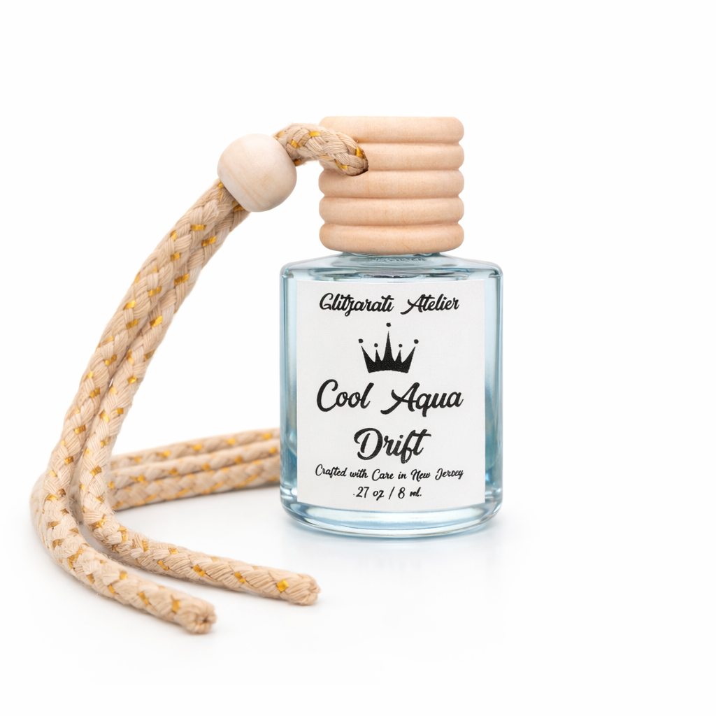 Perfume bottle with wooden diffuser on a white background