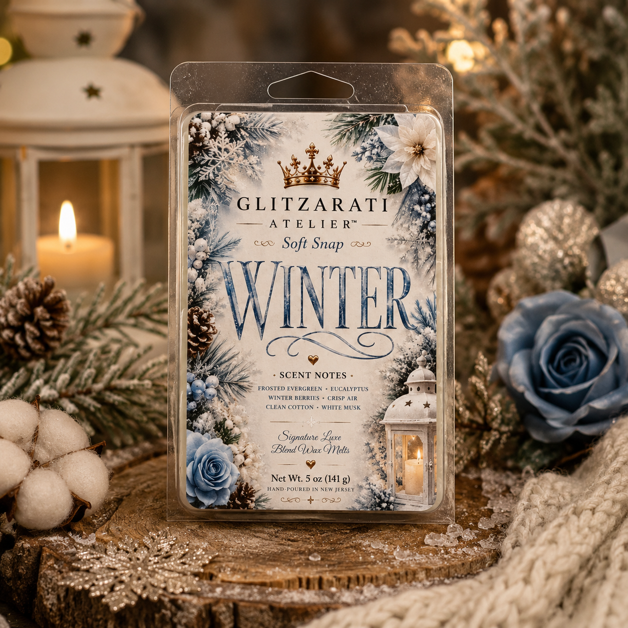 Packaged wax melt with 'Winter' design and Glitzerati Atelier branding, surrounded by decorative elements.
