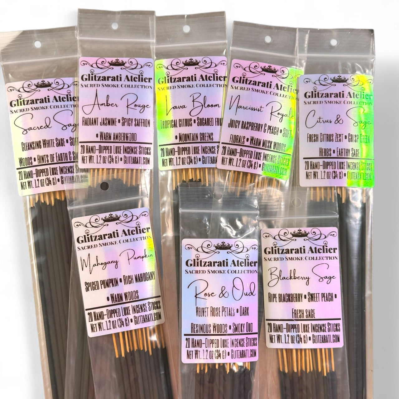 Packaged incense sticks with labels on a white background