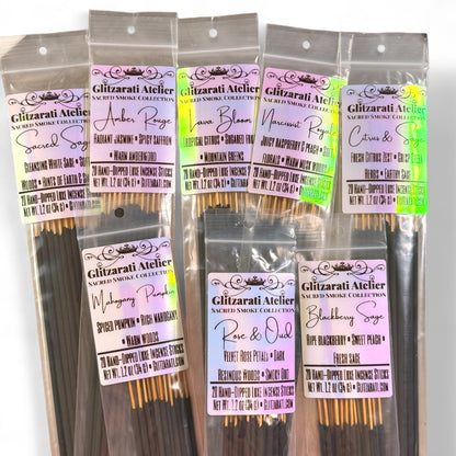 Packaged incense sticks with labels on a white background