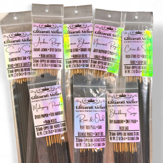 Packaged incense sticks with labels on a white background