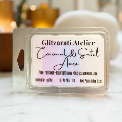 Wax melt in a clear container with a label on a white surface.