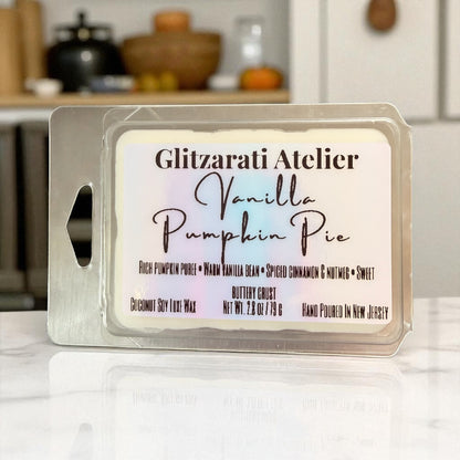 Wax melt packaging with 'Vanilla Pumpkin Pie' description on a kitchen counter.