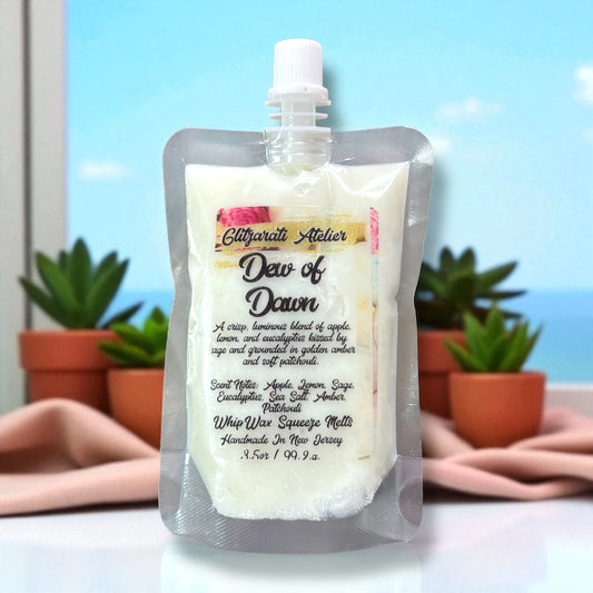 White wax melt packaging with brand name on a blurred background