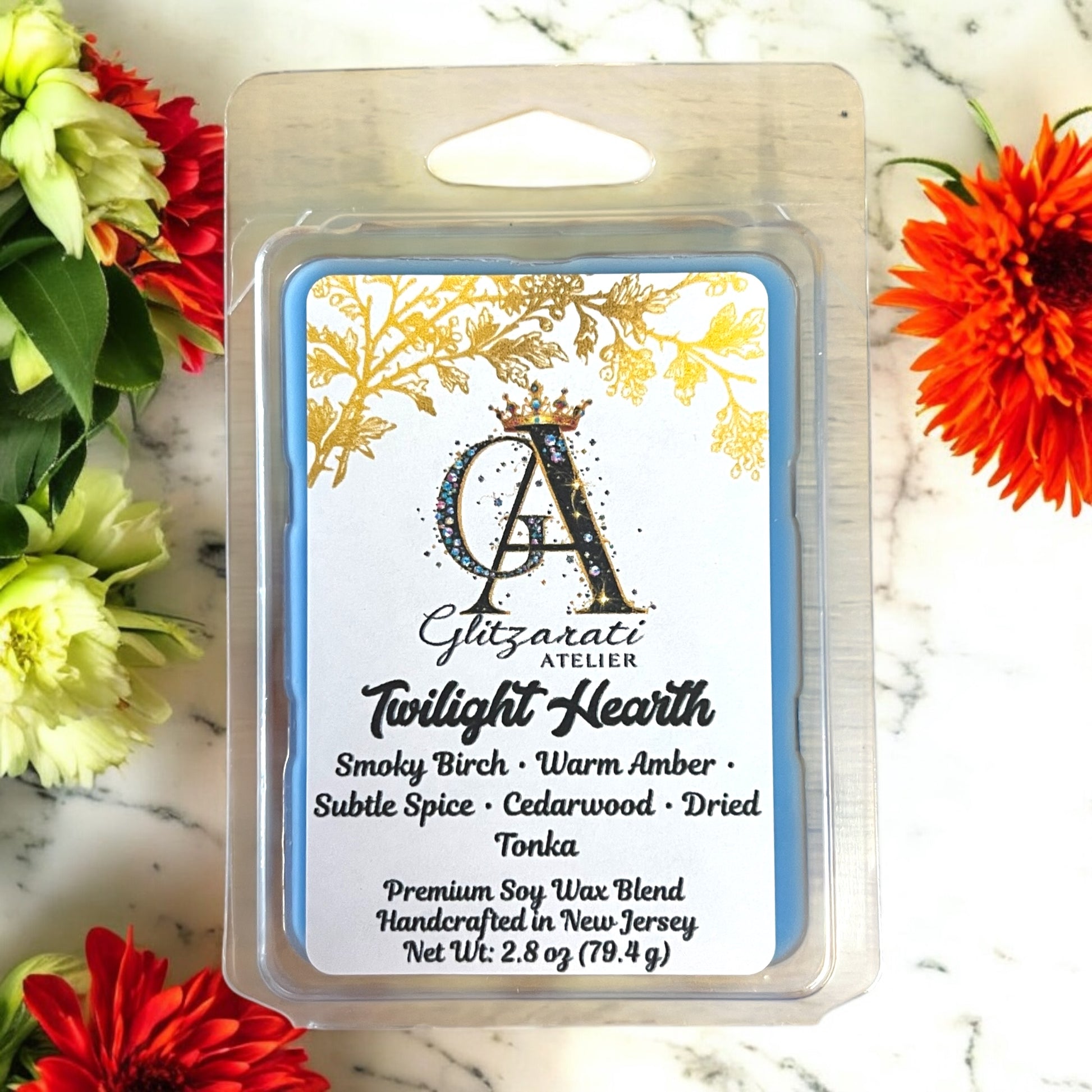 Giltzrati Atelier Twilight Hearth wax melt packaging with floral background