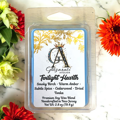 Giltzrati Atelier Twilight Hearth wax melt packaging with floral background