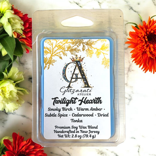 Giltzrati Atelier Twilight Hearth wax melt packaging with floral background