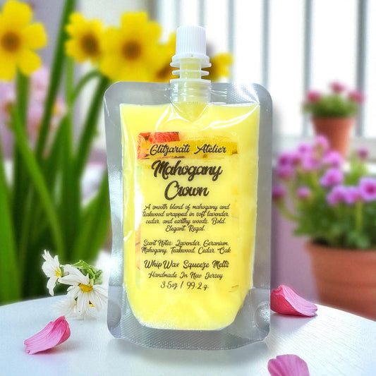 Packaged product with yellow label on a table with flowers in the background