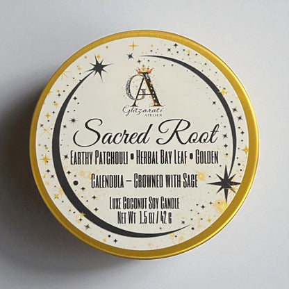 Candle tin labeled 'Sacred Root' with decorative design on a gray background