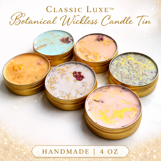 Stack of 'Classic Luxe' botanical wickless candle tins on a light background