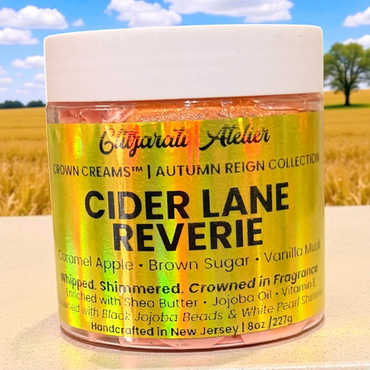 Jar of 'Cider Lane Reverie' Crown Creams with a field and blue sky in the background