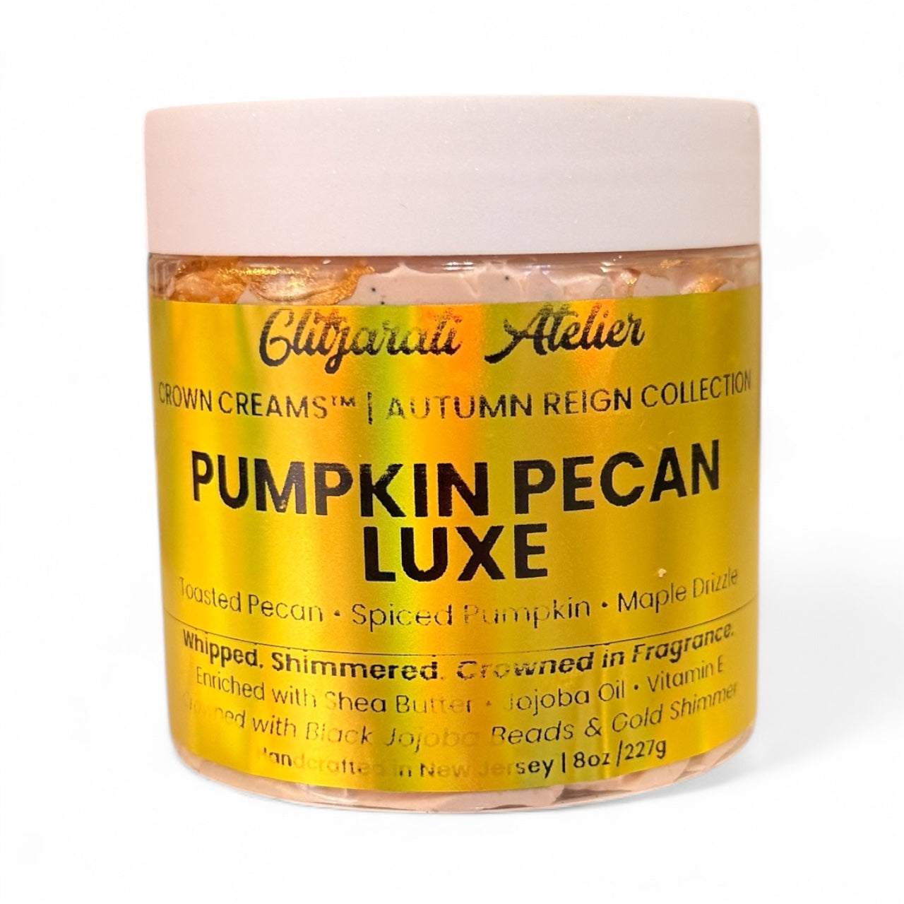 Jar of pumpkin pecan luxe product with yellow label on a white background
