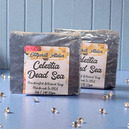 Two bars of Celestia Dead Sea soap with visible branding on a blue background