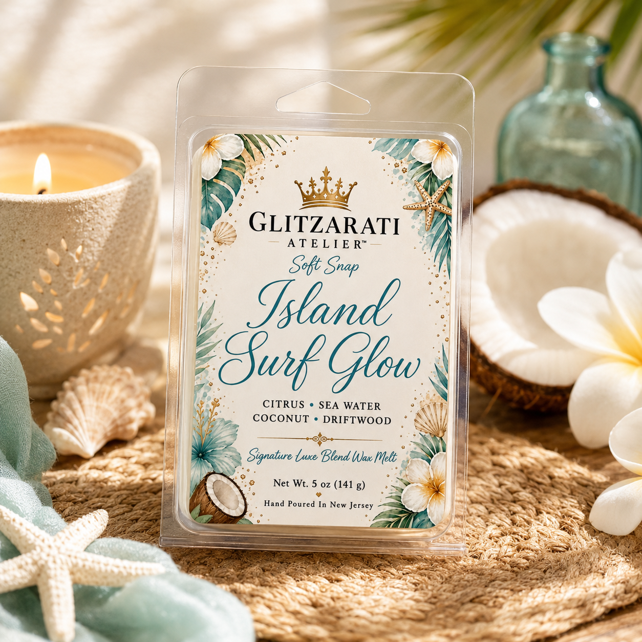 Glitzarati Atelier Island Surf Glow wax melt packaging with a tropical design on a decorative background.