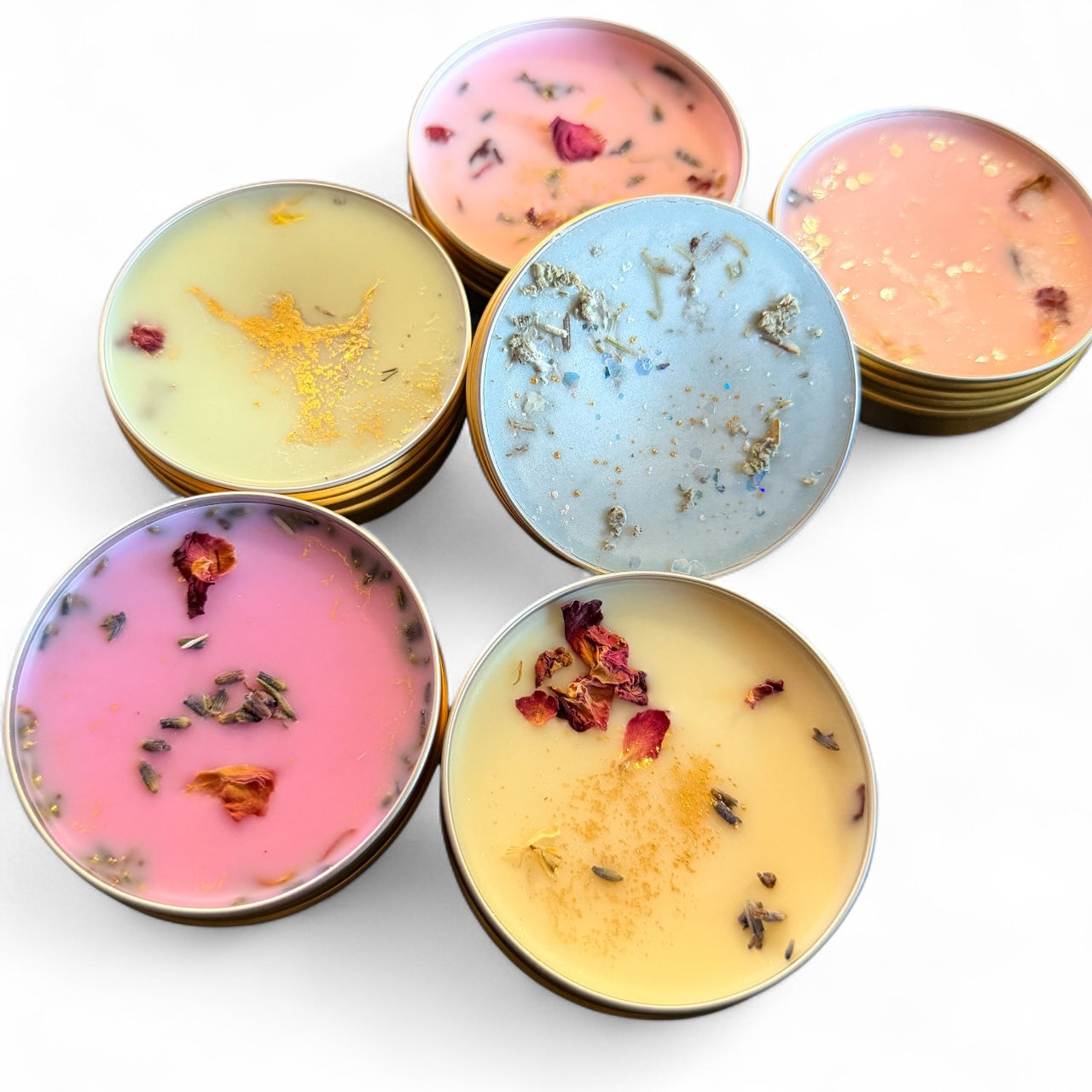 Set of colorful candles with decorative elements on a white background