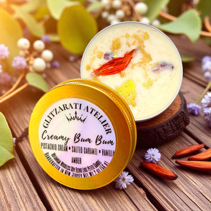 Creamy Bum Bum product with yellow lid on a wooden surface with decorative elements