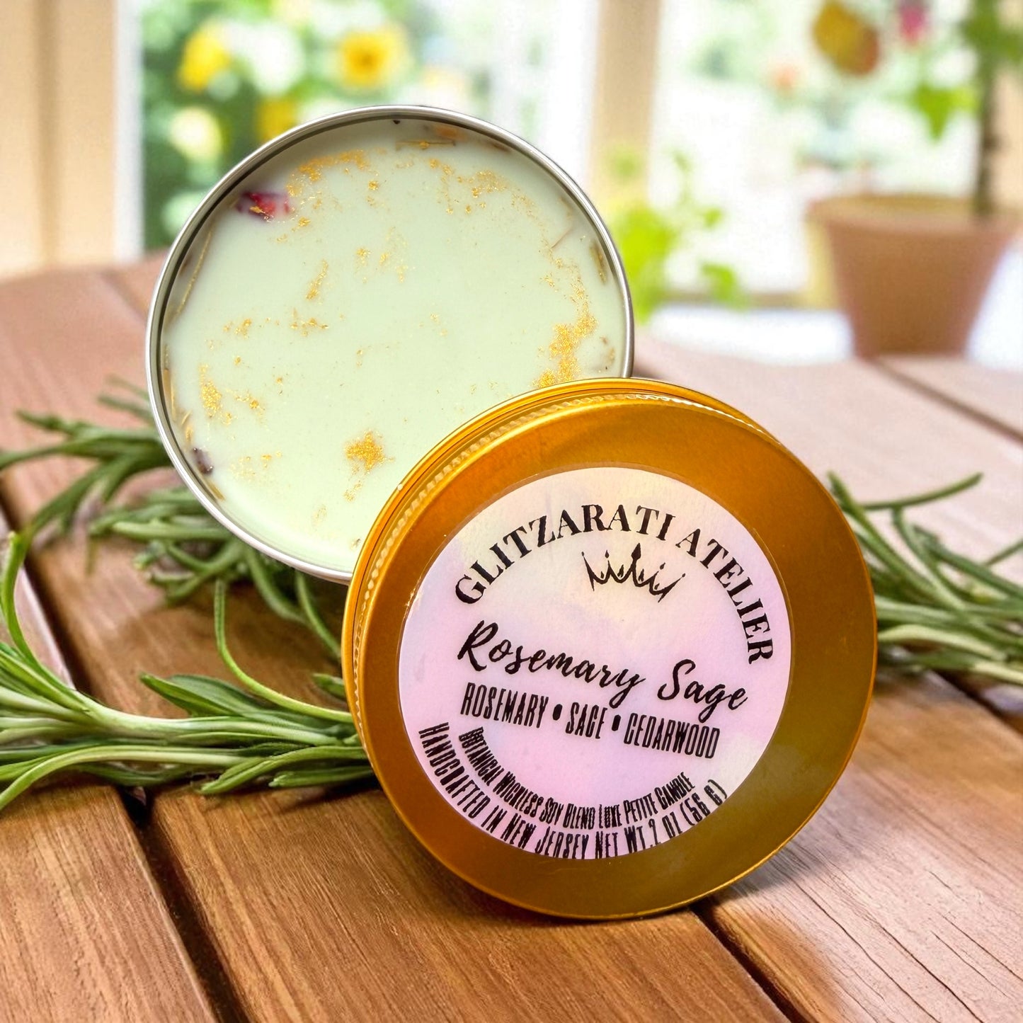 Rosemary Sage balm in a tin with a visible brand label on a wooden surface.