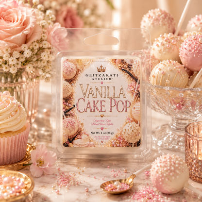 Vanilla cake pop packaging with decorative pink and white flowers and treats in the background