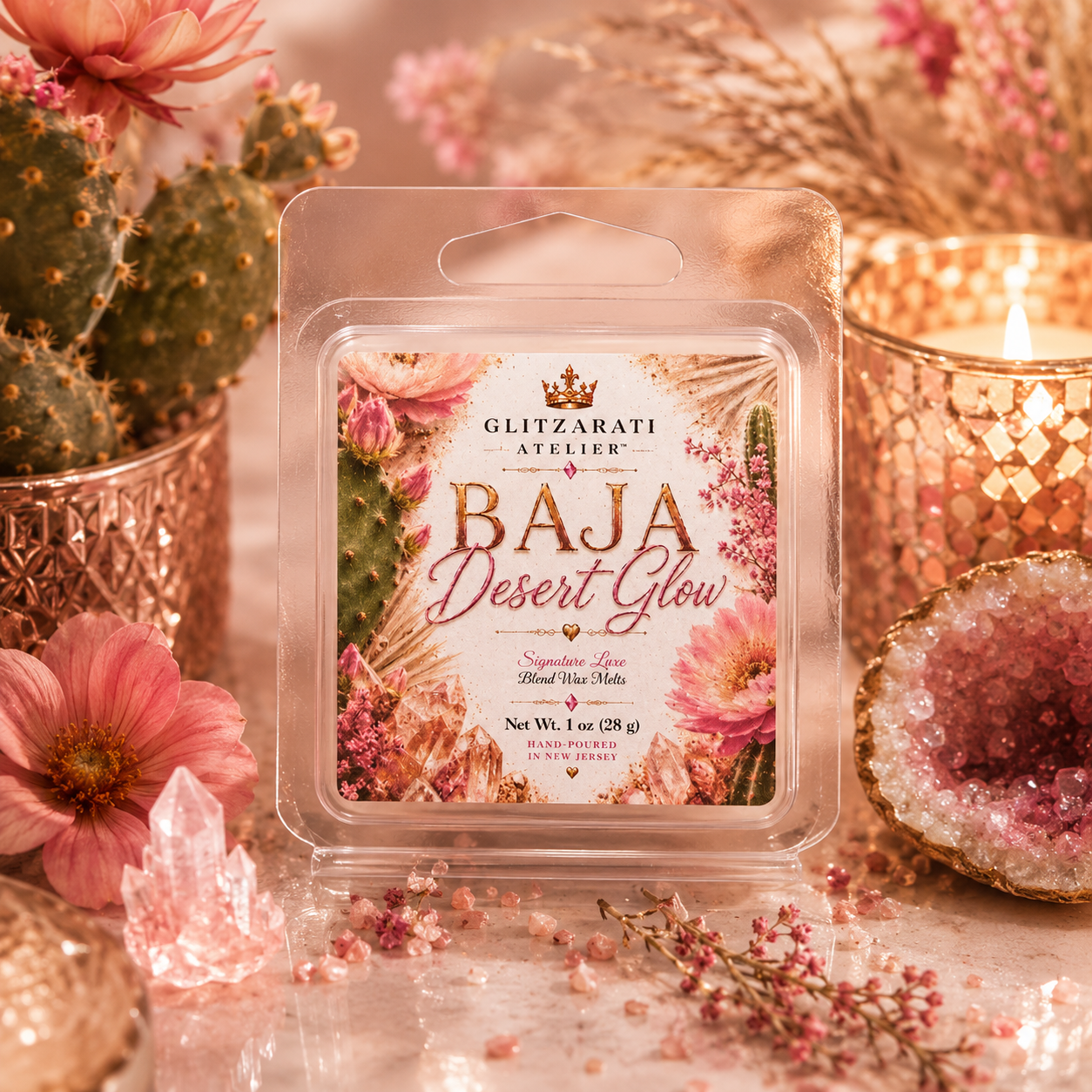 Glitzarati Atelier Baja Desert Glow wax melt surrounded by decorative elements like flowers and candles.