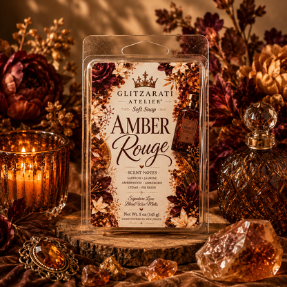 Glitzarati Atelier Amber Rouge wax melt packaging with decorative elements on a warm-toned background.