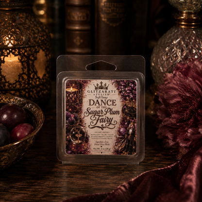 Wax melt package labeled 'Dance of the Sugar Plum Fairy' on a dark background with decorative elements.
