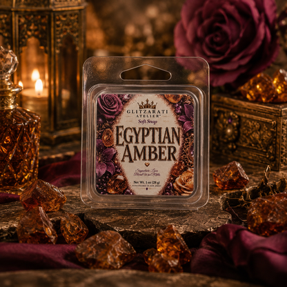 Wax melt packaging labeled 'Egyptian Amber' surrounded by decorative elements.