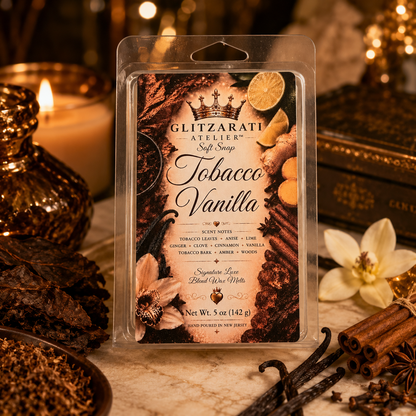 Wax melt packaging with 'Tobacco Vanilla' scent on a decorative background with candles and flowers.