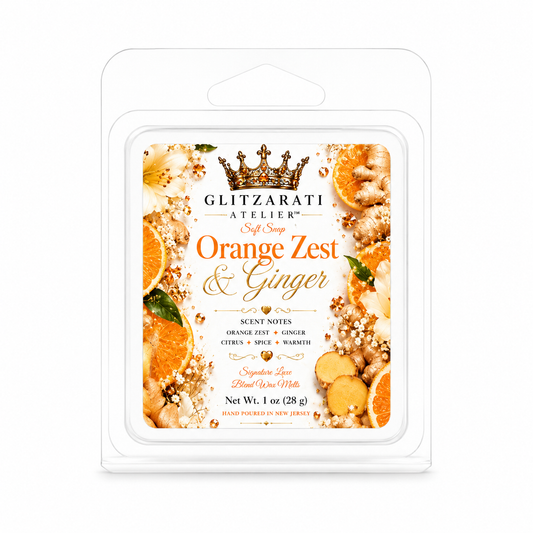 Wax melt packaging with 'Orange Zest & Ginger' design and Glitzarati Atelier branding.