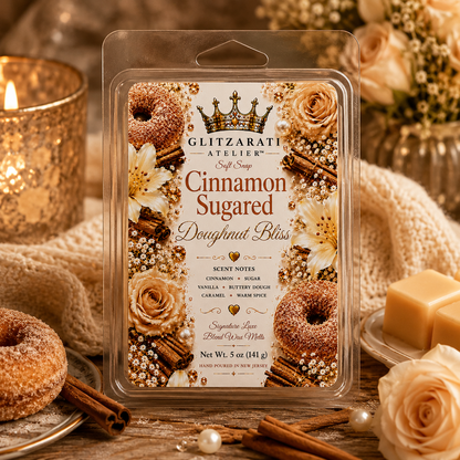 Glzáriati Atelier cinnamon sugared doughnut bliss wax melt packaging with decorative elements on a wooden surface.